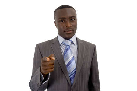 This is an image of a businessman pointing his finger directly, to communicate the message "Your Business Needs You!". This image can be used for advertising themes etc..の写真素材