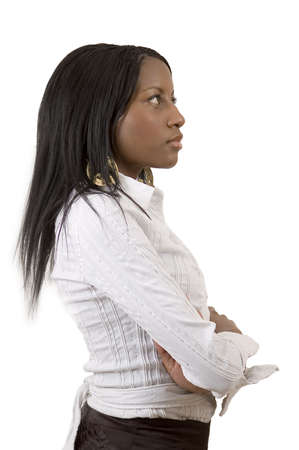 This is an image of a businesswoman pondering/thinking. This image can be used to represent "Vision" themes and "Planning" themes.の写真素材