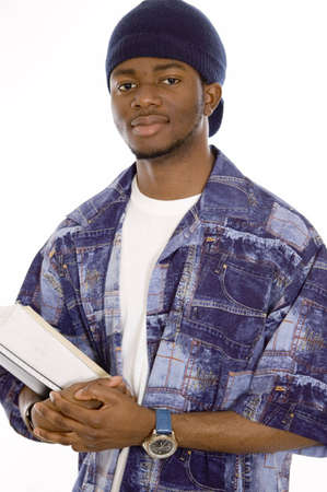 This is an image of a student holding some books. This image can be used to represent student themes.の写真素材