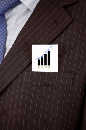 This is an image of a business suit with a graph card inside the suit pocket.の写真素材
