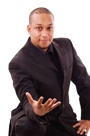This is an image of a businessman happily on his knees, offering his hand of help.の写真素材