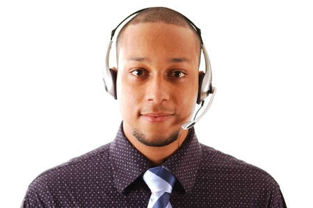 This is an image of a man with a microphone headset on. This image can be used for telecommunication and service themes.の写真素材