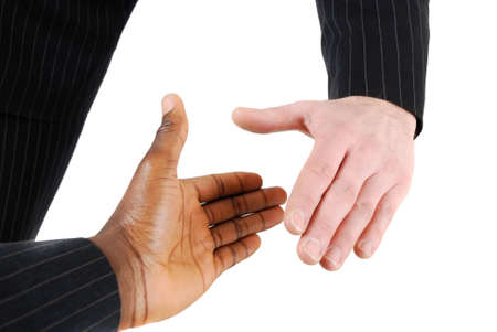 This is an image of two business men performing a handshake. Success concept.