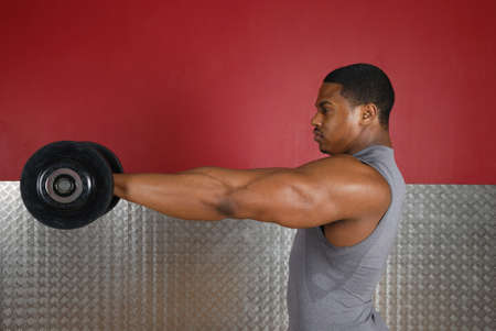 This is an image of a man lifting weights.の写真素材
