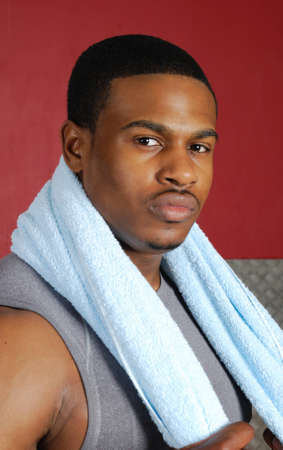 This is an image of a fitness trainer holding towel.の写真素材