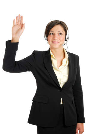 This is an image of a telecommunications woman with her hand raised.の写真素材