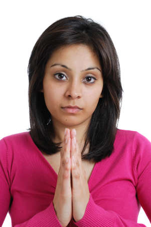 This is an image of a female student doing a prayer gesture.の写真素材