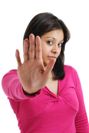 This is an image of a female student showing stop sign with her hand.の写真素材