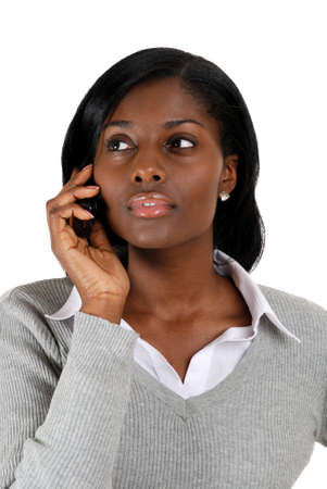 This is an image of a business woman on the on her mobile phoneの写真素材