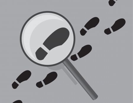 Shoe print tracks being examined by magnifying glass のイラスト素材