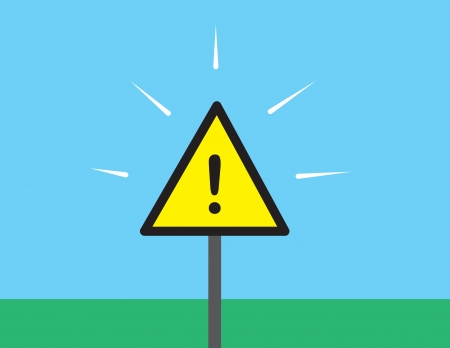 Yellow caution sign outside in the grass のイラスト素材