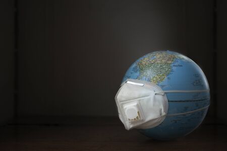 Soft shutter of N95 mask to protect the planet from coronavirus pandemic for creative design poster, banner, backgroundの写真素材
