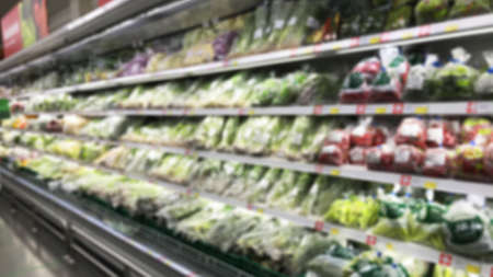 Blurry - Blur image of fresh vegetables and fruits on shelf in supermarket convenience store for background.の写真素材