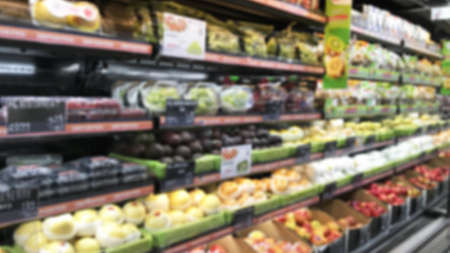 Blurry - Blur image of fresh vegetables and fruits on shelf in supermarket convenience store for background.の写真素材