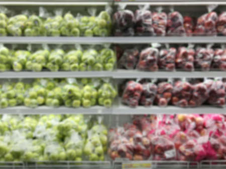 Blurry - Blur image of fresh vegetables and fruits on shelf in supermarket convenience store for background.の写真素材