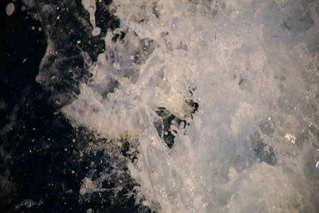 Sea Surface with Waves and Foam. View from above - View from the Boat.
