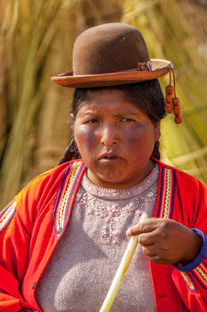 Native Woman with Hat from Los Uros Islandのeditorial素材