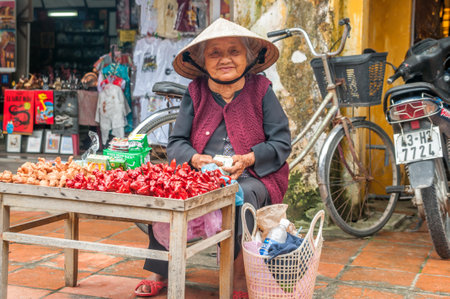 Saleswoman Souvenirs in Hoi An - Vietnamのeditorial素材