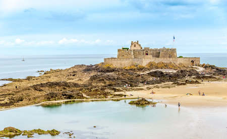SAINT MALO, FRANCE - AUGUST 24,2014 - View at the Fort National. Fort National is a fort on a tidal island a few hundred metres off the walled city of Saint-Malo.のeditorial素材