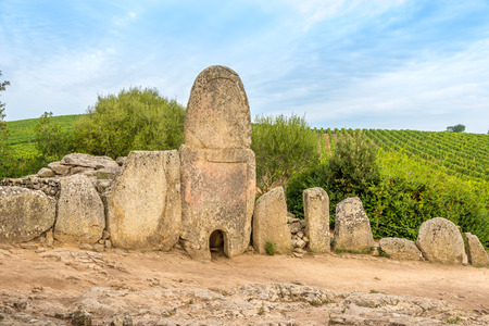 Tomb Coddu Vecchiu near Prisgiona nuraghe - Italyの写真素材
