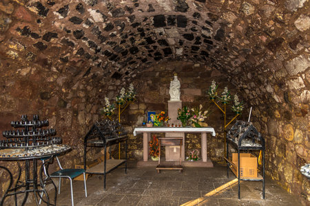 TERGU,ITALY - SEPTEMBER 16,2014 - Inside chapel near church Nostra Signora di Tergu. The church was built using slabs of red trachyte and of brighter limestone for the decorations.のeditorial素材