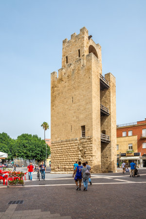 ORISTANO,ITALY - SEPTEMBER 20,2014 - Belltower of Oristano in Sardinia. Was built in 1290, is 19 metres tall and the most striking remaining evidence of the old walls.のeditorial素材