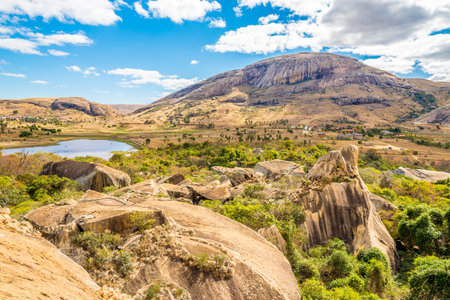 ANJA,MADAGASCAR - AUGUST 03,2015 - The Anja Community Reserve is a woodland area and freshwater lake, situated at the base a large cliff. Much of the reserve is dominated by fallen rocks and boulders and there are two small caves providing habitat for batのeditorial素材