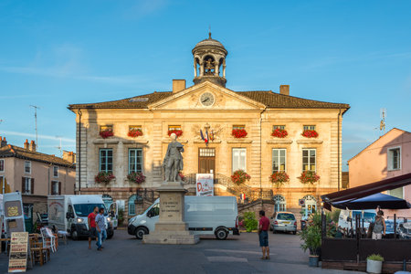 TOURNUS,FRANCE - AUGUST 29,2015 - City Hall in Tournus. In the Place Hotel de Ville stands a statue of Jean-Baptiste Greuze, born in the town in 1725.のeditorial素材