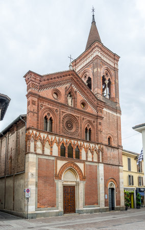 MONZA,ITALY - SEPTEMBER 1,2015 - Church Santa Maria in Strada of Monza.The brickwork facade is triangular at the top, with numerous decorations and geometric elements. It is formed by horizontal bands separated by frames.のeditorial素材