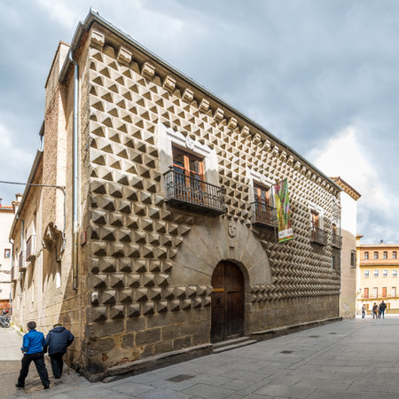 SEGOVIA,SPAIN - APRIL 22,2016 - House Los Picos is most notable for its facade, which is covered entirely by pyramid-shaped granite blocks. The building dates back to the 15th century.のeditorial素材