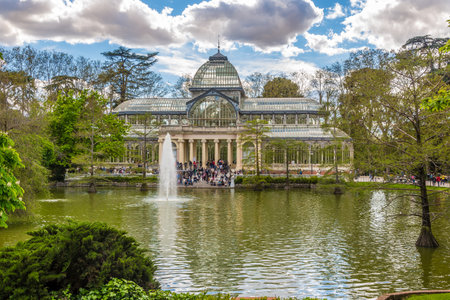 MADRID, SPAIN - APRIL 24.2016 - The Crystal Palace (Palacio de Cristal) is a glass and metal structure Located in Madrids Retiro Park. It was built in 1887 to exhibit flora and fauna from the Philippines.のeditorial素材