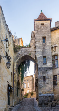 SAINT EMILION,FRANCE - SEPTEMBER 1,2016 - Gate and house de la Cadene in Saint Emilion. Saint Emilion is a commune in the Gironde department in southwestern France.のeditorial素材