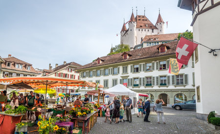 THUN,SWITZERLAND - SEPTEMBER 3,2016 - View at the market place with Castle of Thun. Thun is a town and a municipality in the administrative district of Thun in the canton of Bern in Switzerland.のeditorial素材