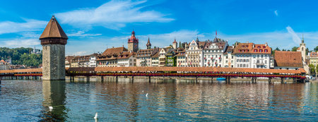 LUZERN,SWITZERLAND - SEPTEMBER 3,2016 - Panoramic view at the Chapel bridge over Reuss river in Luzern. Luzern is a city in central Switzerland.のeditorial素材