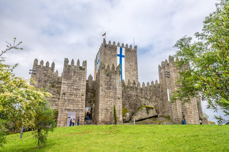 GUIMARAES,PORTUGAL - MAY 14,2017 - View at the Guimaraes castle in Portugal. The city was settled in the 9th century, at which time it was called Vimaranes.のeditorial素材