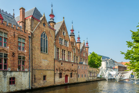 BRUGES,BELGIUM - MAY 20,2018 - View at the historical houses near Rozenhoedkaai canal in Bruges. The historic city centre of Bruges is a prominentのeditorial素材