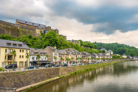 BOUILLON,BELGIUM - MAY 22,2018 - Houses at the bank of Semois river in Bouillon. Bouillon is a municipality in Belgium.のeditorial素材
