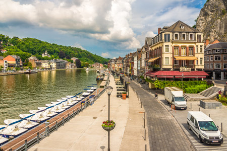 DINANT, BELGIUM - MAY 22,2018 - View at the enbankment of Meuse river in Dinant. Dinant is located in the Upper Meuse Valley.のeditorial素材