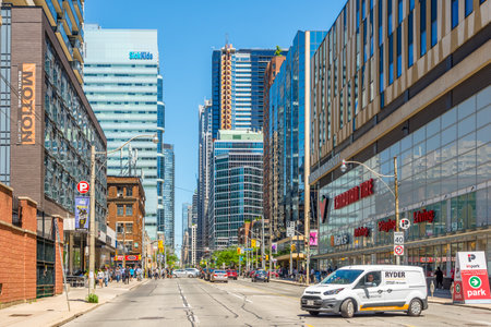 TORONTO,CANADA - JUNE 25,2018 - In the streets of Toronto downtown. Toronto is the capital city of the province of Ontario and the largest city in Canada.のeditorial素材