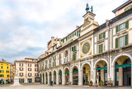 BRESCIA,ITALY - SEPTEMBER 26,2018 - Clock tower at the Loggia place in Brescia. Brescia is a city and comune in the region of Lombardy in northern Italy.のeditorial素材