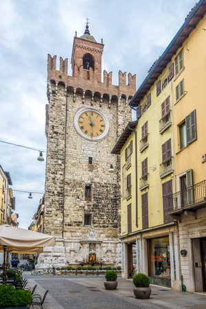 BRESCIA,ITALY - SEPTEMBER 26,2018 - View at the Pallata tower in the streets of Brescia. Brescia is a city and comune in the region of Lombardy in northern Italy.のeditorial素材