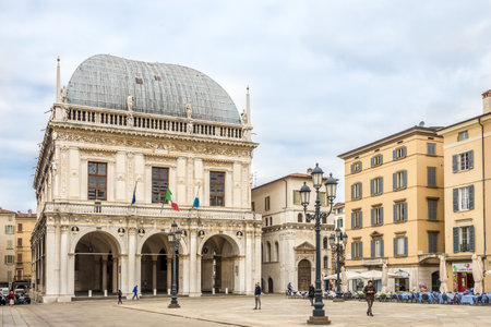 BRESCIA,ITALY - SEPTEMBER 26,2018 - View at the building of City hall (Loggia Palace)in Brescia. Brescia is a city and comune in the region of Lombardy in northern Italy.のeditorial素材