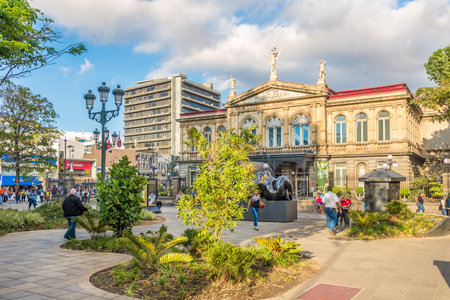 SAN JOSE,COSTA RICA - MARCH 22,2019 - Park in front of the building National Theatre in San Jose. San Jose is Capital of Costa Rica.のeditorial素材
