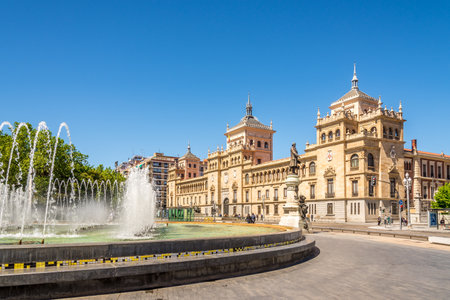 VALLADOLID,SPAIN - MAY 13,2019 - View at the building of Cavalry Academy from Zorrilla Place in Valladolid. Valladolid is made up of a variety of historic houses, palaces, churches, plazas, avenues and parks.のeditorial素材