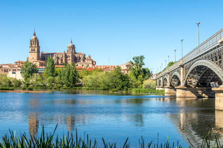 Tormes river with New Cathedral of Salamanca in background, Spainのeditorial素材