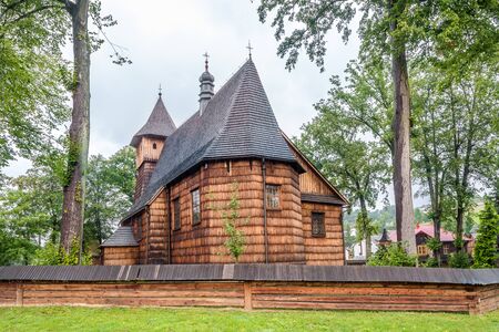 View at the Wooden Church of St. John the Baptist from 16th century in Rzepiennik Biskupi village, Polandの写真素材