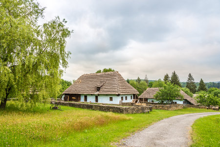 SVIDNIK,SLOVAKIA - JUNE 9,2020 - View at the Wooden Houses in Saknsen near Svidnik town. The open-air museum houses the architecture of a Slovak village.のeditorial素材