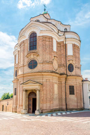 View at the Church of Santa Chiara in the streets of town Bra in Italyの写真素材