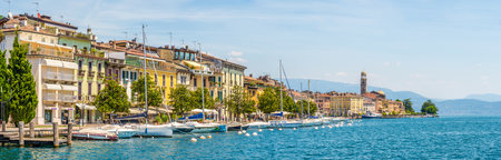 SALO, ITALY - JUNE 28,2021 - Panoramic view at the Promenade of Salo. Salo is a town and comune in the Province of Brescia in the region of Lombardy on the banks of Lake Garda.のeditorial素材