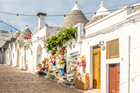 ALBEROBELLO, ITALY - SEPTEMBER 3,2021 - Rock houses Trulli in the streets of Alberobello. Aberobello is a small town in Apulia, southern Italy.のeditorial素材